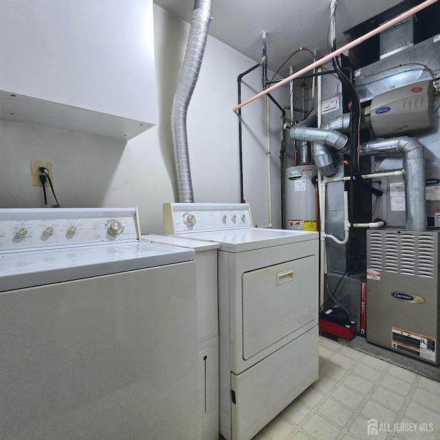 9 Lamberson Ct, Sayreville, NJ 08872 - laundry area featuring separate washer and dryer, light floors, and heating unit