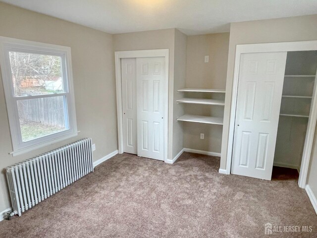 66 W Spring St W, Somerville, NJ 08876 - unfurnished bedroom featuring radiator, carpet floors, and baseboards