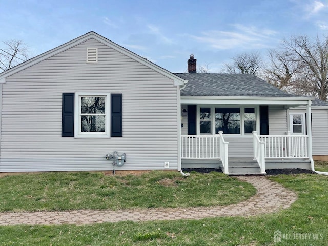 66 W Spring St W, Somerville, NJ 08876 - view of front of house featuring a porch, a chimney, roof with shingles, and a front yard
