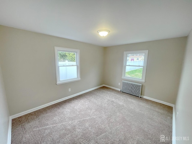 66 W Spring St W, Somerville, NJ 08876 - unfurnished room featuring radiator, carpet, and baseboards