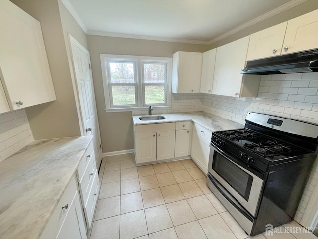 66 W Spring St W, Somerville, NJ 08876 - kitchen with stainless steel range with gas cooktop, under cabinet range hood, light tile patterned floors, crown molding, and white cabinets