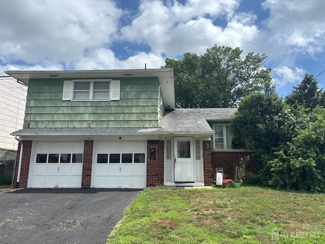 64 S Cliff Rd S, Colonia, NJ 07067 - tri-level home with brick siding, driveway, a front lawn, and a garage
