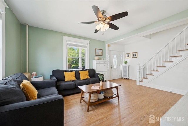 60 S St S, Milltown, NJ 08850 - living area featuring wood finished floors, stairway, and ceiling fan