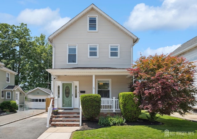 60 S St S, Milltown, NJ 08850 - traditional style home with an outdoor structure, a porch, a detached garage, and a front yard