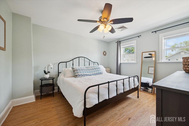 60 S St S, Milltown, NJ 08850 - bedroom with light wood-style flooring and a ceiling fan