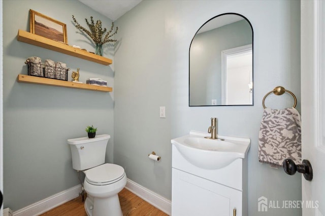 60 S St S, Milltown, NJ 08850 - half bathroom featuring vanity and wood finished floors