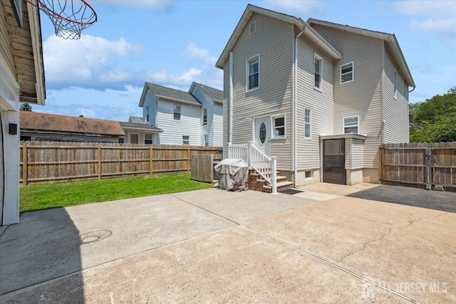 60 S St S, Milltown, NJ 08850 - rear view of property with a patio and a fenced backyard