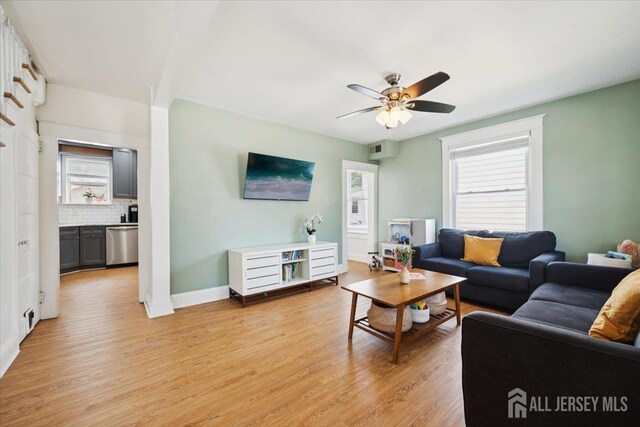 60 S St S, Milltown, NJ 08850 - living room with a ceiling fan and light wood-style flooring