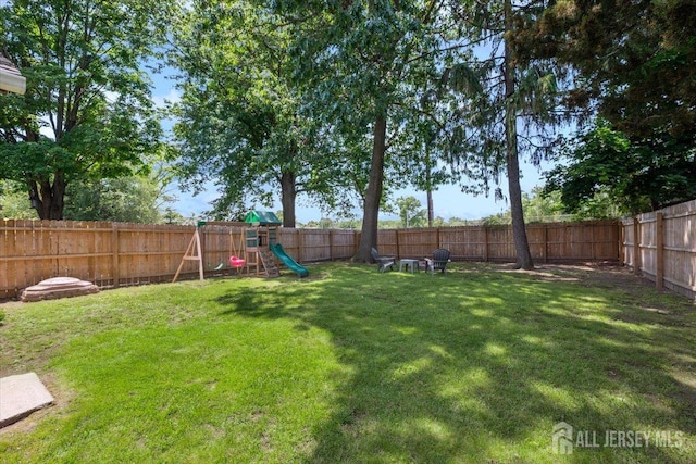 60 S St S, Milltown, NJ 08850 - fenced backyard with a playground