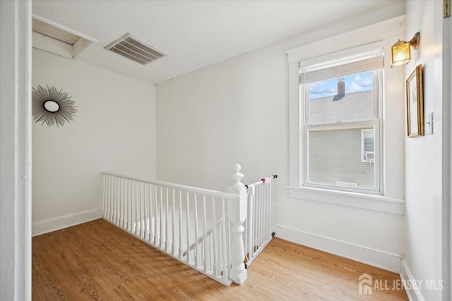 60 S St S, Milltown, NJ 08850 - hallway with wood finished floors and an upstairs landing