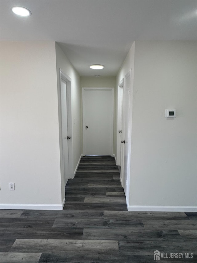 89 Golden Sq, Woodbridge Proper, NJ 07095 - hallway with dark wood-style flooring and recessed lighting
