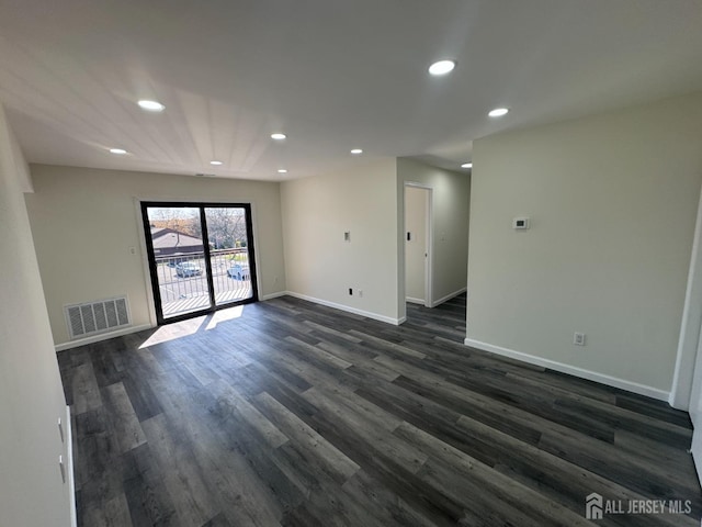 89 Golden Sq, Woodbridge Proper, NJ 07095 - empty room with recessed lighting and dark wood-style floors