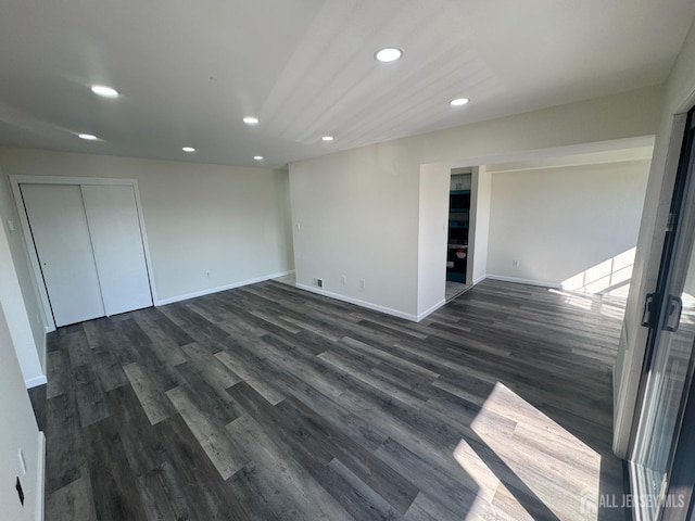 89 Golden Sq, Woodbridge Proper, NJ 07095 - unfurnished bedroom with recessed lighting, dark wood finished floors, and a closet