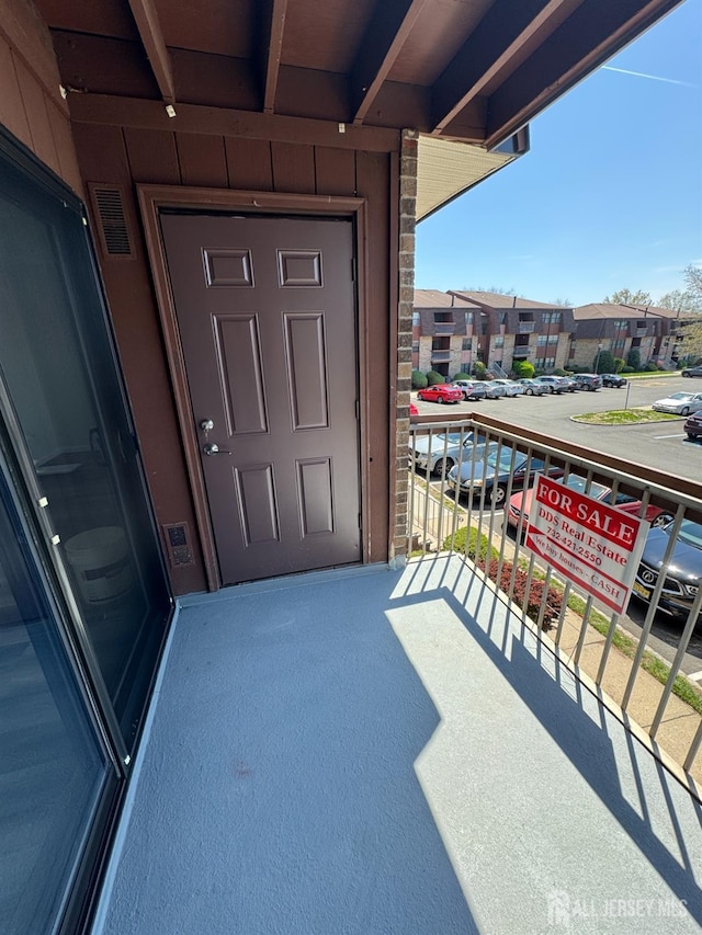 balcony featuring a residential view