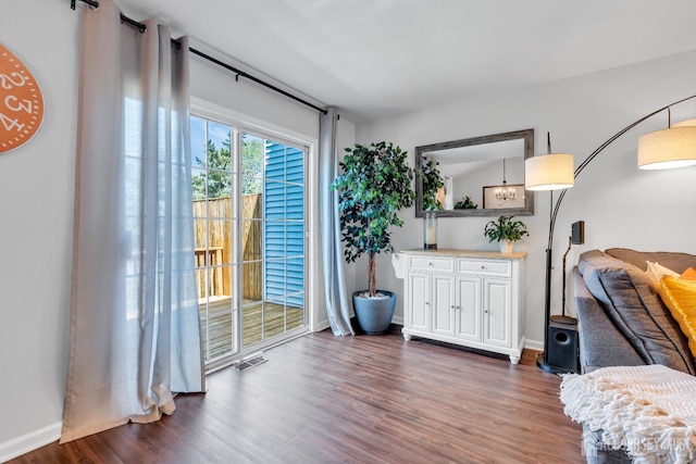 43 Capica Ct, South Amboy, NJ 08879 - living area featuring dark wood-style flooring
