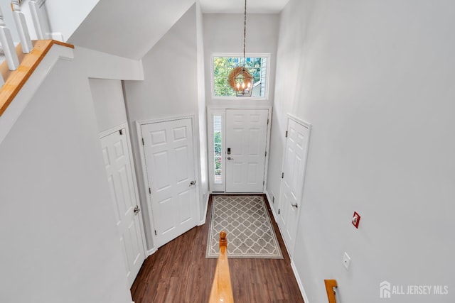 43 Capica Ct, South Amboy, NJ 08879 - foyer entrance featuring wood finished floors, a chandelier, and a high ceiling