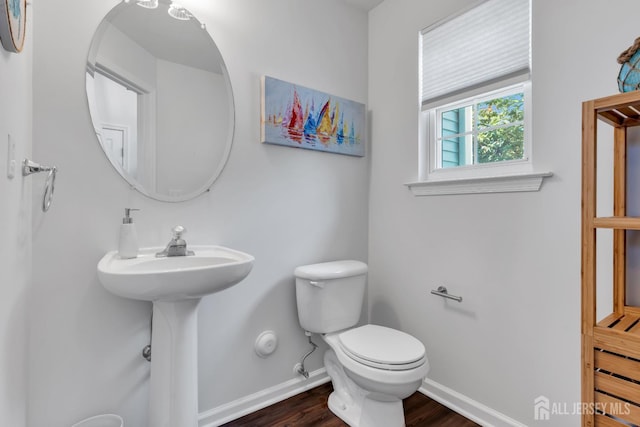 43 Capica Ct, South Amboy, NJ 08879 - half bathroom with toilet and wood finished floors