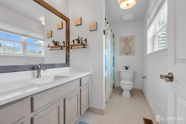 43 Capica Ct, South Amboy, NJ 08879 - bathroom featuring healthy amount of natural light, vanity, tile patterned floors, and a shower with curtain