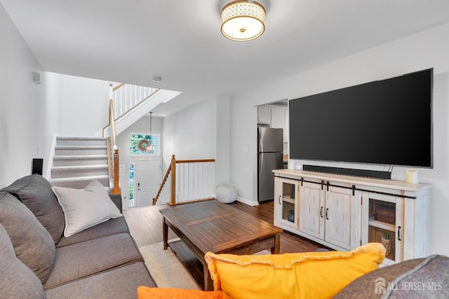 43 Capica Ct, South Amboy, NJ 08879 - living area featuring wood finished floors and stairs