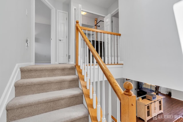 43 Capica Ct, South Amboy, NJ 08879 - staircase with wood finished floors and baseboards