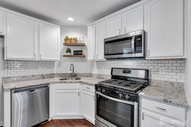 43 Capica Ct, South Amboy, NJ 08879 - kitchen featuring appliances with stainless steel finishes and white cabinetry