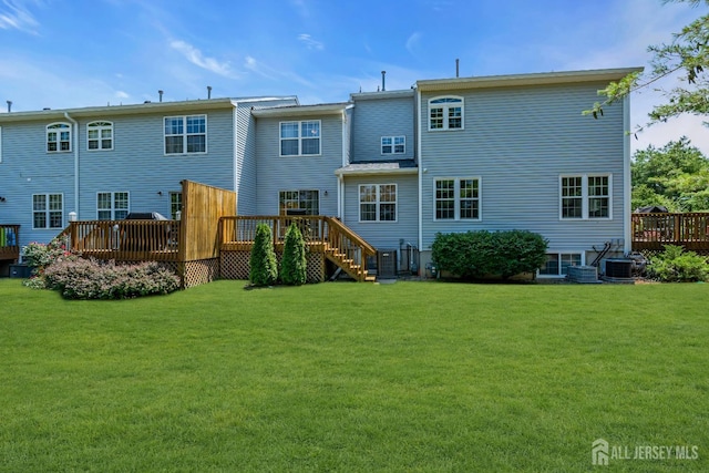 43 Capica Ct, South Amboy, NJ 08879 - rear view of property with a lawn and a deck