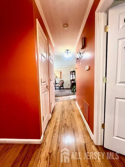 37 Kearney Ave, Keyport, NJ 07735 - hallway with light wood finished floors and baseboards