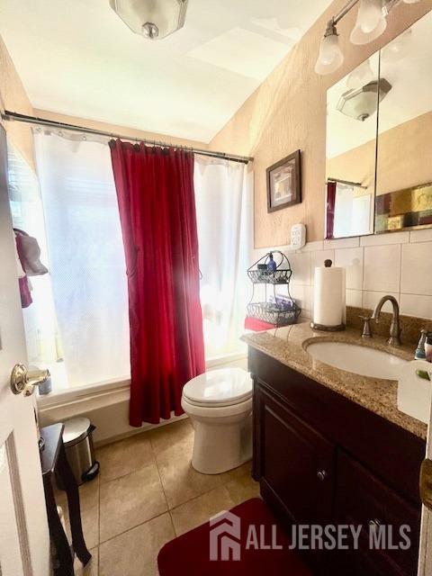 37 Kearney Ave, Keyport, NJ 07735 - full bath featuring vanity, shower / tub combo with curtain, and tile patterned floors