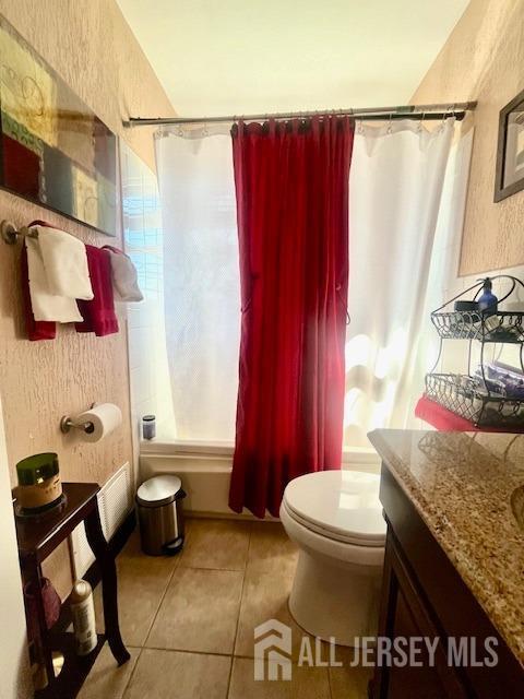 37 Kearney Ave, Keyport, NJ 07735 - full bath with tile patterned floors, vanity, and shower / tub combo with curtain