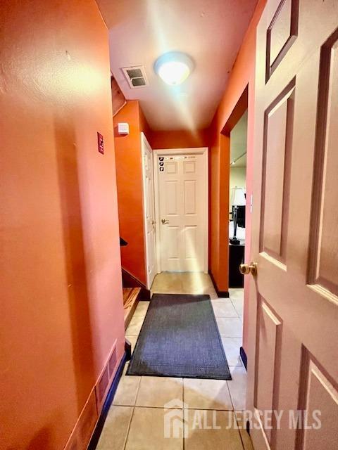 37 Kearney Ave, Keyport, NJ 07735 - hallway featuring light tile patterned flooring