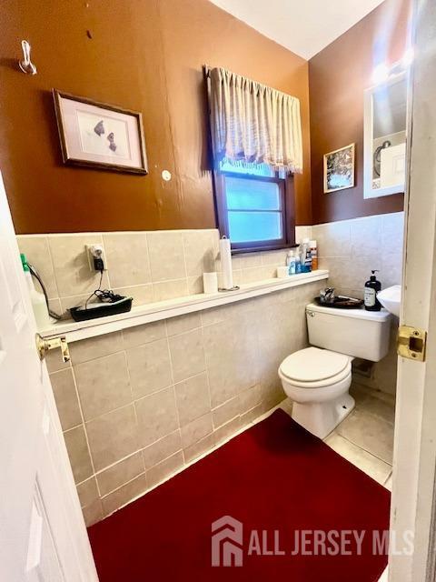 37 Kearney Ave, Keyport, NJ 07735 - bathroom featuring tile walls and tile patterned flooring