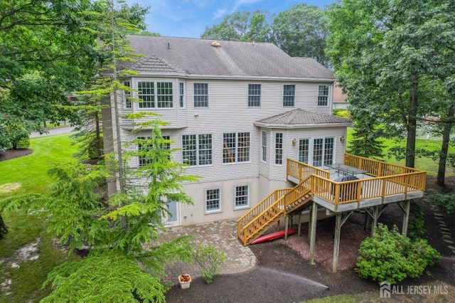 7 Pershing Ct, North Brunswick, NJ 08902 - rear view of house with a deck, stairway, and a patio