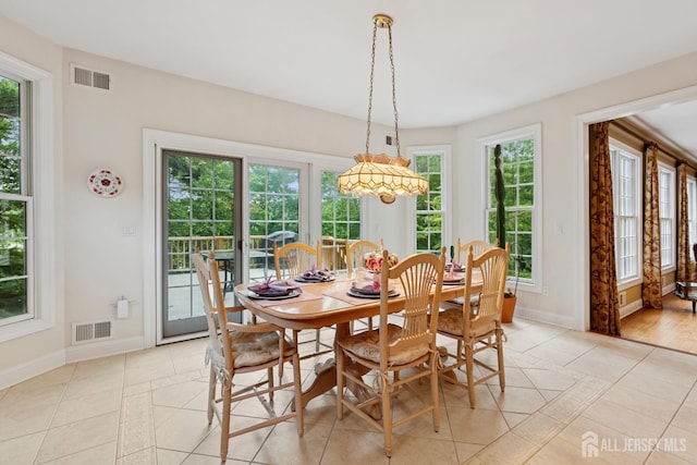 7 Pershing Ct, North Brunswick, NJ 08902 - dining area featuring light tile patterned floors