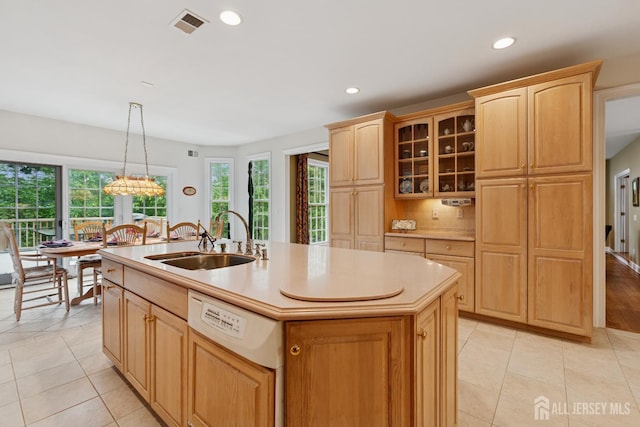 7 Pershing Ct, North Brunswick, NJ 08902 - kitchen featuring light tile patterned flooring, light countertops, plenty of natural light, light brown cabinets, and recessed lighting