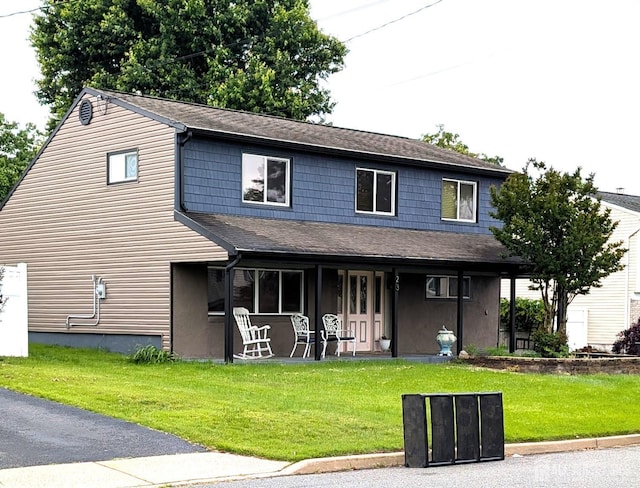 23 Orchard Dr, Old Bridge, NJ 08857 - view of front facade with a shingled roof, a front yard, and a porch