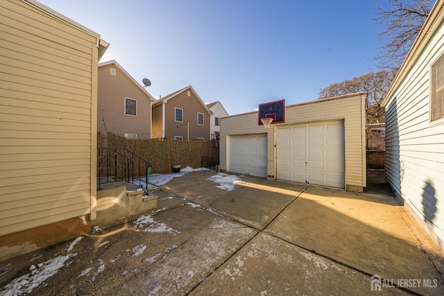 detached garage with fence