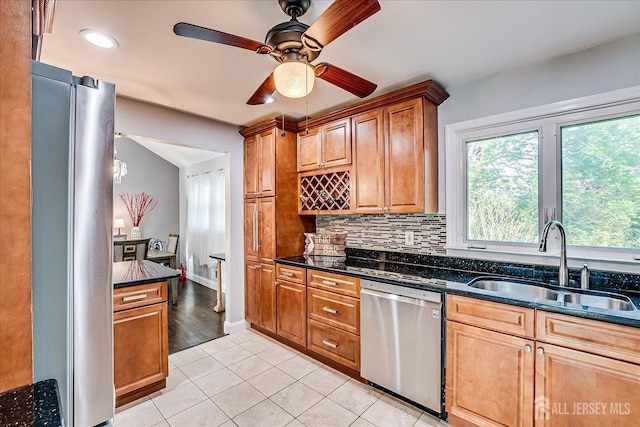 12 Sherry Rd, East Brunswick, NJ 08816 - kitchen featuring stainless steel appliances, a sink, backsplash, light tile patterned floors, and a ceiling fan