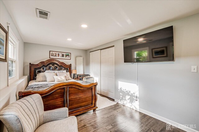 12 Sherry Rd, East Brunswick, NJ 08816 - bedroom with wood finished floors, recessed lighting, a closet, and baseboards