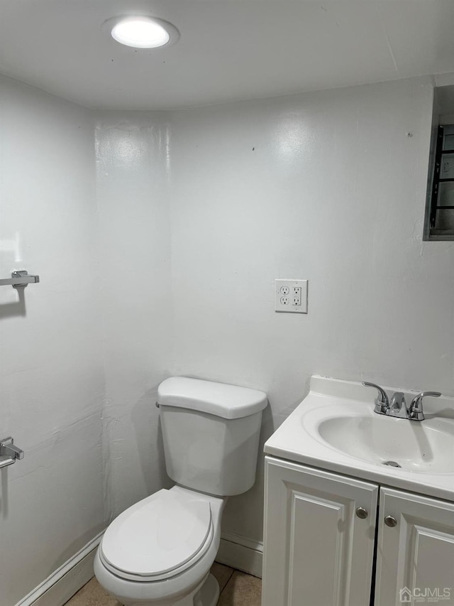 half bath with toilet and vanity