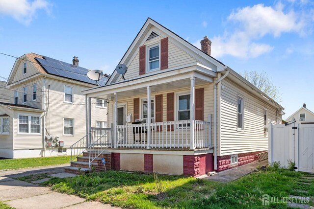 view of front of property featuring a porch