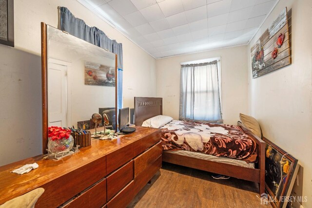 bedroom featuring dark hardwood / wood-style floors