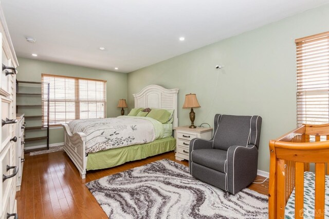 bedroom featuring hardwood / wood-style flooring