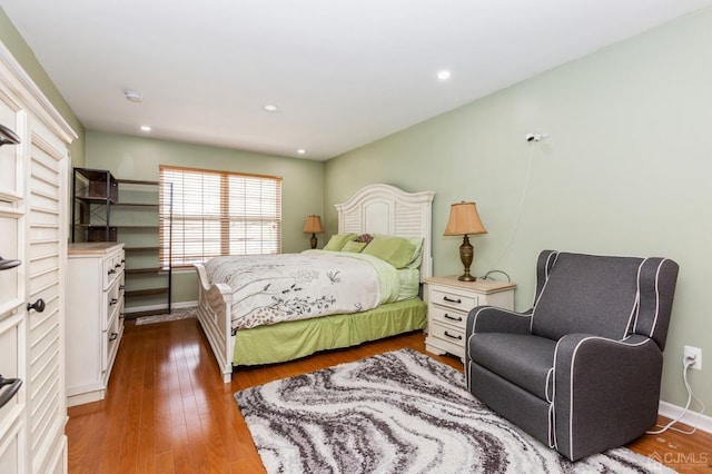 bedroom featuring dark hardwood / wood-style floors