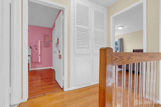 186 Tyler Ave, Iselin, NJ 08830 - corridor featuring light wood-style flooring and baseboards
