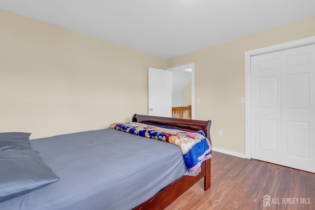 186 Tyler Ave, Iselin, NJ 08830 - bedroom with wood finished floors and baseboards