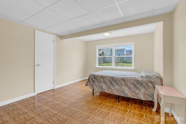 186 Tyler Ave, Iselin, NJ 08830 - bedroom with a paneled ceiling and baseboards