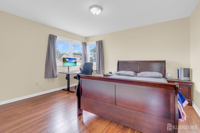 186 Tyler Ave, Iselin, NJ 08830 - bedroom featuring wood finished floors and baseboards