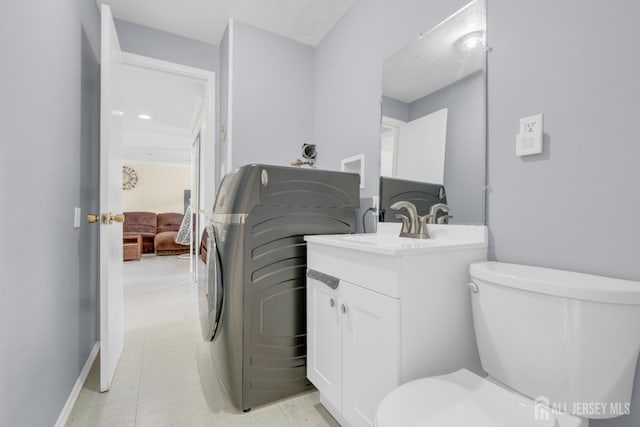 186 Tyler Ave, Iselin, NJ 08830 - bathroom with vanity, ensuite bathroom, and washer / dryer