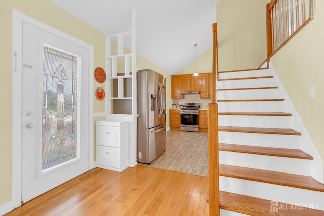 186 Tyler Ave, Iselin, NJ 08830 - staircase with wood finished floors and lofted ceiling