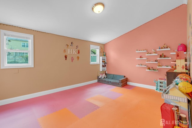 186 Tyler Ave, Iselin, NJ 08830 - game room featuring vaulted ceiling and carpet